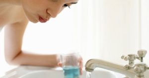 Is this woman using the best natural mouthwash?